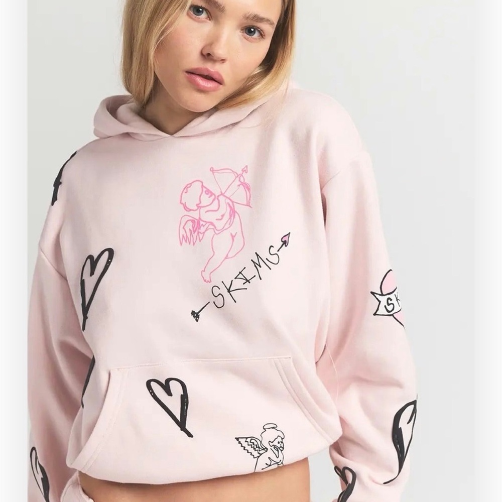 SKIMS Light Pink Graphic Hoodie with Black Accents